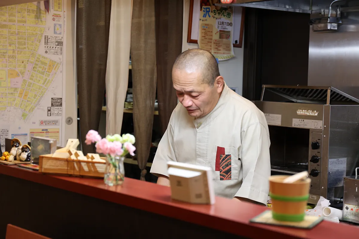 店主　藤原 康治の写真